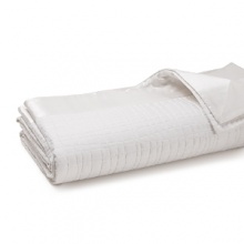 An abstract quilted pattern infuses this luxe HUGO BOSS coverlet with textural richness. An oversized silk border adds a crisp, elegant edge. An abstract quilted pattern infuses this luxe HUGO BOSS coverlet with textural richness. An oversized silk border adds a crisp, elegant edge.