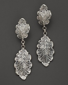 Intricately wrought sterling silver oak leaves form elegant earrings. By Buccellati.