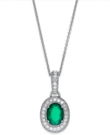 Make a sparkling impact with this pretty pendant. Set in sterling silver, an oval-cut green agate (1-1/10 ct. t.w.) glows against a halo of round-cut diamonds (1/4 ct. t.w.). Approximate length: 18 inches. Approximate drop: 1/2 inch. Make a sparkling impact with this pretty pendant. Set in sterling silver, an oval-cut green agate (1-1/10 ct. t.w.) glows against a halo of round-cut diamonds (1/4 ct. t.w.). Approximate length: 18 inches. Approximate drop: 1/2 inch.