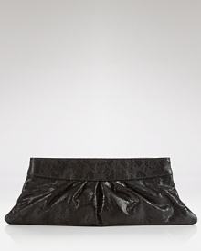 Shapely and high-shine, Lauren Merkn's python clutch makes a leek statement under your arm. Style the luxe little with a little red dress and pumps--it likes to stay out late. Shapely and high-shine, Lauren Merkn's python clutch makes a leek statement under your arm. Style the luxe little with a little red dress and pumps--it likes to stay out late.
