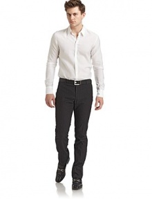 THE LOOKSubtle stripe printWaistband with belt loopsButton flyVertical welt pocketsCreased front and back legsBack welt pocketsTHE FITRise, about 9Inseam, about 36THE MATERIAL71% wool/27% cotton/2% elastaneCARE & ORIGINDry cleanMade in Italy THE LOOKSubtle stripe printWaistband with belt loopsButton flyVertical welt pocketsCreased front and back legsBack welt pocketsTHE FITRise, about 9Inseam, about 36THE MATERIAL71% wool/27% cotton/2% elastaneCARE & ORIGINDry cleanMade in Italy