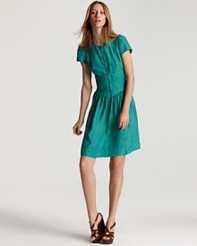 A youthful silhouette showcases a bright hue, crafted in soft, washed silk with a lived-in feel. From Burberry Brit.