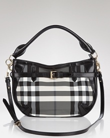 Let the British invade your closet in high style with Burberrry's signature check crossbody. Shoulder the black and white bag for timeless chic over cashmere and a color-pop coat. Let the British invade your closet in high style with Burberrry's signature check crossbody. Shoulder the black and white bag for timeless chic over cashmere and a color-pop coat.