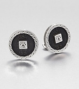 From the Classic Chain Collection. With the look of ancient coins, discs of blackened silver sit handsomely within carved settings of polished sterling silver.Sterling silverSwivel backMade in Bali