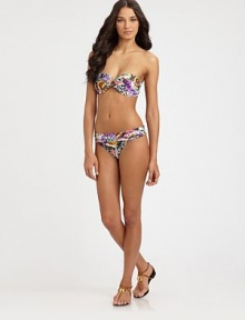 A vivacious design featuring an intoxicating butterfly print, complemented exquisitely by flattering, ruched sides.Fold-over waistbandRuched sidesModerate coverageFully lined85% polyamide/15% spandexHand washImported Please note: Bikini top sold separately. A vivacious design featuring an intoxicating butterfly print, complemented exquisitely by flattering, ruched sides.Fold-over waistbandRuched sidesModerate coverageFully lined85% polyamide/15% spandexHand washImported Please note: Bikini top sold separately.