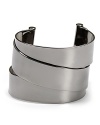 Show your cuff love with this hematite-plated bracelet from MARC BY MARC JACOBS. A hard-hitting take on girlish ribbons, this piece hints at tough-chic.