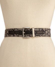 Get the best of both worlds with this chic reversible belt from Calvin Klein. Turns from rich leather to jacquard in a flash. Get the best of both worlds with this chic reversible belt from Calvin Klein. Turns from rich leather to jacquard in a flash.