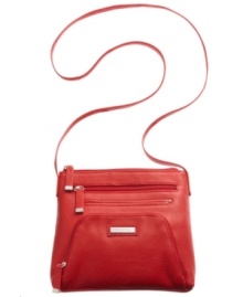 Keep up with the cool crowd with this perfect day-to-night companion from Calvin Klein. Whether you're hitting the town or running errands in the 'hood, it's slim silhouette and easy access pockets are ideal on the go. Keep up with the cool crowd with this perfect day-to-night companion from Calvin Klein. Whether you're hitting the town or running errands in the 'hood, it's slim silhouette and easy access pockets are ideal on the go.