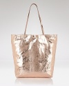 Carlos Falchi's tote is a luxe take on a classic shape. In metallic micro-fiber with an interior pouch, this style strikes an enviable balance between practicality and polish.