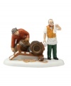 Intricately crafted in fine porcelain, this collectible figurine from Department 56 depicts a pub owner checking his shipping list as an employee lifts barrels onto a hand cart fashioned straight out of the 19th century.