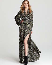 Billowy and bohemian, this Rachel Zoe silk gown exudes luxe style. A belt cinches the waist and a deep slit adds a movement.