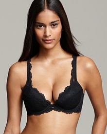 A convertible push-up bra with intricate floral lace trim and plunging neckline, a sultry style from Calvin Klein