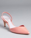 A dramatic pointed toe is made feminine by pretty pink hued leather. From Delman.