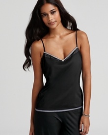 Delicate mesh and satin trim accent this simply stylish camisole from Calvin Klein. Delicate mesh and satin trim accent this simply stylish camisole from Calvin Klein.