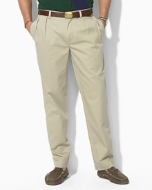 Tailored from a mid-weight timeworn chino, these timeless pants are designed with double forward pleats and a narrow leg. Standard-rise belted waist. Side on-seam pockets, split-besom pockets at back. Embroidered pony accents the back right pocket. Zip fly with button closure. Tailored from a mid-weight timeworn chino, these timeless pants are designed with double forward pleats and a narrow leg. Standard-rise belted waist. Side on-seam pockets, split-besom pockets at back. Embroidered pony accents the back right pocket. Zip fly with button closure.
