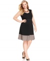 Delight on your special night with Spense's sleeveless plus size dress, defined by a flattering A-line shape.