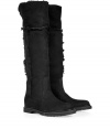 Up the style quotient of your cold weather look with these rugged-luxe shearling boots from Rossano Bisconti - Round toe, chunky sole and low block heel, supple suede, over-the-knee length with the option to fold-over, shearling lined - Style with skinny jeans, an oversized cashmere pullover, and a cape coat