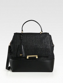 Woven raffia with a subtle sheen accented with luxurious leather and radiant hardware.Leather top handle, 4½ dropDetachable adjustable shoulder strap, 19-21½ dropPush-clasp flap closureCenter stud strapProtective metal feetOne outside zip pocketOne inside zip pocketThree inside open pocketsFully lined10W X 11H X 4¾DImported Woven raffia with a subtle sheen accented with luxurious leather and radiant hardware.Leather top handle, 4½ dropDetachable adjustable shoulder strap, 19-21½ dropPush-clasp flap closureCenter stud strapProtective metal feetOne outside zip pocketOne inside zip pocketThree inside open pocketsFully lined10W X 11H X 4¾DImported