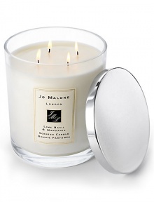 A stunning bouquet lit across four wicks, the luxury candle envelops a room and lingers for hours. Burn time is approximately 230 hours. A stunning bouquet lit across four wicks, the luxury candle envelops a room and lingers for hours. Burn time is approximately 230 hours.