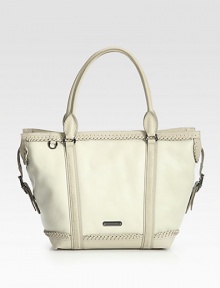 Whipstitched trim, herringbone braiding, decorative buckles and bold tassels add to this tailored design of rich leather.Double top handles, 7 dropTop zip closeOne inside zip pocketTwo inside open pocketsCotton lining12W X 13H X 5½DImported Whipstitched trim, herringbone braiding, decorative buckles and bold tassels add to this tailored design of rich leather.Double top handles, 7 dropTop zip closeOne inside zip pocketTwo inside open pocketsCotton lining12W X 13H X 5½DImported