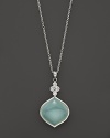 Faceted white sapphire and chalcedony pendant set in sterling silver. By Elizabeth Showers.