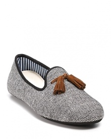 This sleek tweed loafer is crafted in wool herringbone and accented with contrast trim and contrast suede tassels at the tongue. This sleek tweed loafer is crafted in wool herringbone and accented with contrast trim and contrast suede tassels at the tongue.