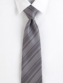An understated thick-and-thin tonal stripe gets extra richness from its silk twill weave. SilkDry cleanMade in Italy An understated thick-and-thin tonal stripe gets extra richness from its silk twill weave. SilkDry cleanMade in Italy