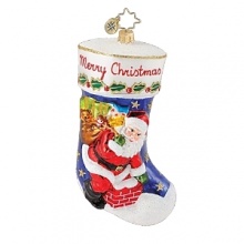 Stockings were hung on the tree with care. Santa is coming and it's sure to be a Merry Christmas. This hand blown ornament embodies the joy of the season. Stockings were hung on the tree with care. Santa is coming and it's sure to be a Merry Christmas. This hand blown ornament embodies the joy of the season.
