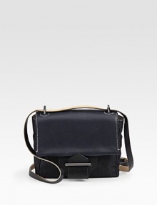 A petite flap-front silhouette pairs burnished glovetan, glazed bridle and vachetta leathers with a chic denim body.Adjustable crossbody strap, 24-26 dropSnap flap closureOne outside open pocketOne inside zip pocketOne inside open pocketFully lined7W X 6H X 2DImported A petite flap-front silhouette pairs burnished glovetan, glazed bridle and vachetta leathers with a chic denim body.Adjustable crossbody strap, 24-26 dropSnap flap closureOne outside open pocketOne inside zip pocketOne inside open pocketFully lined7W X 6H X 2DImported
