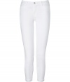 These pristine white capri jeans from J Brand are the perfect foundation for warm weather looks - Classic five-pocket styling, skinny leg, mid-rise - Form-fitting, capri length - Pair with contemporary printed tops and bright leather accessories