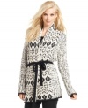 Snuggle into this chunky cardigan from Calvin Klein Jeans. In allover marled knit with a Fair Isle pattern, it channels a cool, ski-chic vibe.