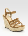 Backed by a stretchy slingback, skinny suede straps top a textured espadrille wedge and platform. Braided hemp wedge, 4½ (115mm)Braided hemp platform, 1½ (40mm) Compares to a 3 heel (75mm)Suede upperLeather liningRubber solePadded insoleImported