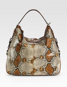 Rich genuine python with leather trim in a roomy carryall.Top handle, 6½ dropTop zip closureOne inside zip pocketTwo inside open pocketsFully lined14W X 12½H X 6½DMade in Italy Rich genuine python with leather trim in a roomy carryall.Top handle, 6½ dropTop zip closureOne inside zip pocketTwo inside open pocketsFully lined14W X 12½H X 6½DMade in Italy