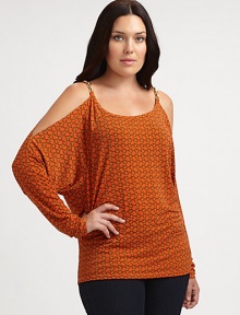 Offering unfettered style, a shoulder-flaunting top with a chic, chain-link print and chain straps.Round neckDolman sleevesChain-link detail at cold shouldersPull-on styleAllover printAbout 26 from shoulder to hemPolyester/spandexDry cleanImported