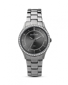 Swarovski crystals around the polished steel case add a touch of glitz to this classic link band watch from Skagen.