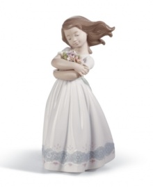 A darling little little girl with flowers, representing innocence, fantasy and curiosity without bounds. Crafted by Lladró, Spain's most esteemed artisans of porcelain figurines. A darling little little girl with flowers, representing innocence, fantasy and curiosity without bounds. Crafted by Lladró, Spain's most esteemed artisans of porcelain figurines.