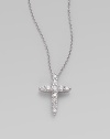A simply beautiful 18k white gold cross encrusted in dazzling diamonds. Diamonds, .39 tcw 18k white gold Chain length adjust from about 16 to 18 Pendant size, about ½ Lobster clasp closure Made in Italy 