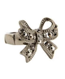 Glittering and glam! A beautiful bow motif adorns this striking stretch ring from Betsey Johnson. Made in hematite tone mixed metal, it's embellished with dazzling crystals. Ring adjusts to fit finger.