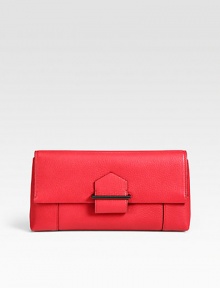 A slim silhouette of soft deer skin, finished with a flap-front closure. Magnetic snap flap closureOne inside zip pocketCotton lining10W X 5½H X 1½DImported A slim silhouette of soft deer skin, finished with a flap-front closure. Magnetic snap flap closureOne inside zip pocketCotton lining10W X 5½H X 1½DImported