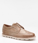A more casual, easy-wearing fit for the classic wingtip, complete with perforated trim and Goodyear welt soles for added ventilation, strength and comfort. Leather Leather lining Padded insole Goodyear welt rubber sole Imported 