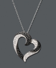 A beautifully abstract heart features swirls of contrasting colors. An open heart design crafted in sterling silver features round-cut white diamonds (1/4 ct. t.w.) and round-cut black diamonds (1/4 ct. t.w.). Approximate length: 18 inches. Approximate drop: 7/8 inch. A beautifully abstract heart features swirls of contrasting colors. An open heart design crafted in sterling silver features round-cut white diamonds (1/4 ct. t.w.) and round-cut black diamonds (1/4 ct. t.w.). Approximate length: 18 inches. Approximate drop: 7/8 inch.