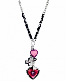 For the hopeless romantic. GUESS's trendy y-shaped pendant features a multitude of charms including pink epoxy hearts, a black epoxy ribbon, and sparkling AB crystals. Setting crafted in silver tone mixed metal with a black ribbon woven through. Approximate length: 18 inches + 2-inch extender. Approximate drop: 4 inches.