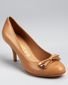 Feminine and refined, the Bettina pump from renowned footwear designer Salvatore Ferragamo is polished and professional.