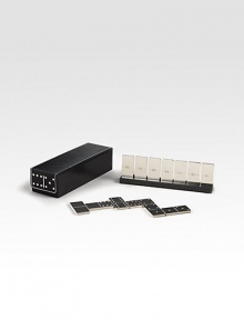 A polished reimagining of a time-honored favorite, an essential domino set is crafted from rich leather and polished nickel for unparalleled game-time panache. Leather/nickel8.375 X 2.675Clean with a soft clothImported A polished reimagining of a time-honored favorite, an essential domino set is crafted from rich leather and polished nickel for unparalleled game-time panache. Leather/nickel8.375 X 2.675Clean with a soft clothImported