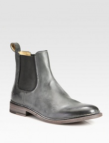 A classic chelsea boot is a sartorial standard, crafted here in burnished leather for a well-worn finish and with side elastic gores for a superior fit.Leather upperLeather liningPadded insoleLeather soleImportedThis style runs true to size. We recommend ordering your usual size for a standard fit. 