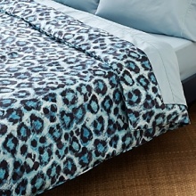 This printed cheetah spot ventures into the wild to turn your personal habitat into an exotic escape. In hues of blue, black and white, its unconventional tonality creates a bold focal point. This printed cheetah spot ventures into the wild to turn your personal habitat into an exotic escape. In hues of blue, black and white, its unconventional tonality creates a bold focal point.