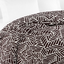Warm your bedroom style with this rich, coffee bean brown DIANE von FURSTENBERG king duvet cover, adorned with a detailed geometric print in creamy white. Warm your bedroom style with this rich, coffee bean brown DIANE von FURSTENBERG king duvet cover, adorned with a detailed geometric print in creamy white.