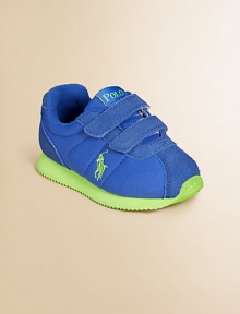 Crafted in a classic grip-tape silhouette with suede trim, pony embroidery and rubber jogger sole.Grip-tape closureSuede/leather/nylon upperRubber solePadded insoleImported Crafted in a classic grip-tape silhouette with suede trim, pony embroidery and rubber jogger sole.Grip-tape closureSuede/leather/nylon upperRubber solePadded insoleImported