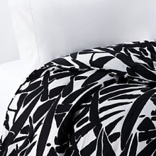 Keep it simple...or dress it up with color. This collection is white on black in a bold print. Leaves of giant grass grace this soft cotton duvet, complementing any modern bedroom. Keep it simple...or dress it up with color. This collection is white on black in a bold print. Leaves of giant grass grace this soft cotton duvet, complementing any modern bedroom.