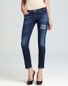 Distressing brings on-trend edge to these weekend-perfect skinnies from AG Adriano Goldschmied Jeans.